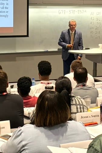 Phil Buffington teaching a class of students